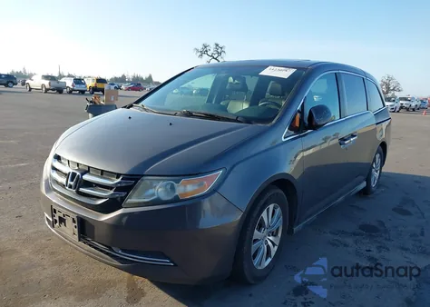 2014 Honda Odyssey Ex-L z USA, uszkodzony, nr VIN 5FNRL5H63EB006078
